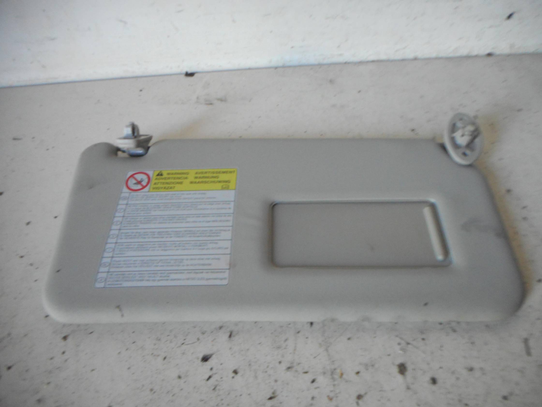 Aletta parasole parabrezza dx.